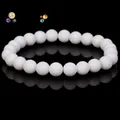 Elegant white matte turquoise beaded bracelet featuring high-quality round gemstones - White Stone