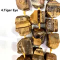 Dettaglio ravvicinato di pietre naturali occhio di tigre per gioielli fai da te - Occhio di Tigre (4) / 15 Pezzi/Confezione