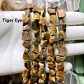 Primer plano que muestra la textura natural de las piedras en bruto de ojo de tigre - 1 Hilo (Aprox. 40cm) / Ojo de tigre