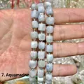 Close-up of light blue aquamarine octagonal faceted cube gemstone beads - 10mm / Aquamarine