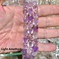Detailed macro view of natural light purple amethyst sugar cube faceted beads for DIY jewelry - 8mm / Light Amethyst