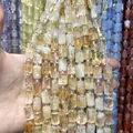 Primo piano di perle in pietra naturale gialla 8x12mm per creazione di gioielli fai da te - 26 Pezzi/Confezione (8x12mm) / Citrino