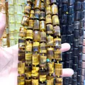 Close-up detail of natural Tiger's Eye cylindrical faceted beads for DIY jewelry - 21 Beads Set / Tiger Eye Stone Bracelet