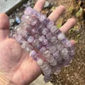 Detailed view of natural amethyst faceted stone beads for DIY jewelry making - Approx. 9x15mm / Light Amethyst