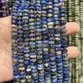 Primo piano della trama delle perline abaco in pietra naturale blu da 4x8 mm. - Confezione da 75 / Lapislazzulo