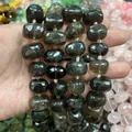 Detailed view showing the facets of translucent dark smoky quartz oval beads for DIY crafts. - Smoky Quartz Faceted Beads (B29) / 15x20mm (Approx 21 Pieces)