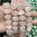 Primo piano di perle di quarzo rosa naturale sfaccettate ovali per la creazione di gioielli - Perline Sfaccettate di Quarzo Rosa (B29) / 15x20mm (Circa 21 Pezzi)