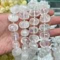 Close-up of faceted clear natural crystal beads for DIY jewelry making and bracelets - Clear Quartz Faceted Beads (B29) / 15x20mm (Approx 21 Pieces)