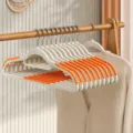 Non-marking anti-slip clothes hanger in monsoon orange for home wardrobe use. - Reinforced Dual-hook Style / Monsoon Orange