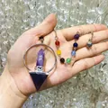 Detailed view of natural amethyst crystal pendulum with 7 chakra beads on a chain - Natural / Amethyst