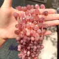 Macro view of faceted strawberry quartz waterdrop beads for DIY jewelry making projects - Strawberry Quartz