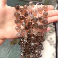 Close-up of faceted teardrop natural smoky quartz crystal beads for DIY jewelry making - Smoky Quartz