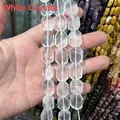 Close-up of faceted natural clear quartz crystal beads for DIY jewelry making - White Crystal