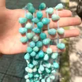 Primo piano di perle di cristallo naturale a goccia sfaccettata per creazione di gioielli - 1 Pezzo / Amazzonite