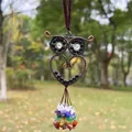 Intricate handmade copper wire owl pendant featuring colorful tumbled chakra crystal stones hanging - Obsidian