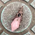 Detail of rose quartz hexagonal point pendant with ornate vintage copper wire wrap. - 12 Facet Hexagonal Cone (B18) / Antique Bronze Rose Quartz