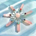 Radial arrangement of rose quartz hexagonal prism pendants with colorful chakra stones. - Rose Quartz