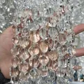 Close-up of irregular faceted natural Brazilian white crystal beads for DIY jewelry - 15x20mm (Slight Inclusion) / Clear