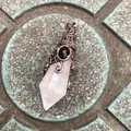 Vintage hexagonal crystal pendant with bronze metal wrap and black stone accent - 12 Facet Hexagonal Cone (B18) / Antique Bronze Clear Quartz