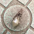 Vintage bronze wire-wrapped 12-faceted hexagonal crystal cone pendant with black gemstone - 12 Facet Hexagonal Cone (B18) / Antique Bronze Labradorite