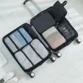 Complete 7-piece travel organizer bag set for efficient suitcase packing and storage - 7-Piece Set / Black