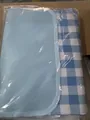 Waterproof blue and white gingham picnic mat folded in a clear plastic shipping bag - Morning Sun Grid / 1x1.5m