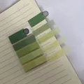 Collection of Morandi green gradient PET sticky index tabs shown on lined notebook paper - Light Green