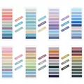 Macro detail showing 80 colors of transparent index stickers in various themed palettes. - Minimalist Full Color Style