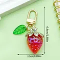 Detail view showing dimensions of cute red resin strawberry keychain with leaf accessory - Red Resin Strawberry Pendant Style (ER936)