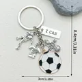 Macro view of creative soccer theme alloy keychain with I CAN tag and dimensions - Silver Soccer Pendant Style (LS420)