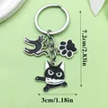 Λεπτομερείς διαστάσεις για ένα εμαγιέ μπρελόκ με μαύρη γάτα, μαχαίρι και πατούσα - Στυλ Γάτα που Δαγκώνει Μαχαίρι με Πατούσα (ER789)