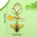 Porte-clés abeille mignon avec breloques fleur et nid d'abeille, longueur totale 7,9 cm - Style Fleur Nid d'abeille Abeille (ER1752)