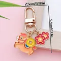 Detailed view of cute pink zodiac horse keychain with dimensions and gold coin charms. - 2026 Year of the Horse Wealthy Flower Copper Coin Pony (ER2134) / 2.5x5.4mm / Pink