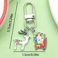 Christmas enamel keychain featuring reindeer and snowman sleigh charms with size labels - Christmas Sleigh, Snowman & Reindeer (ER838)