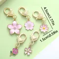 Set of 5 colorful pink enamel flower charms with heart-shaped golden lobster clasps for bags - Flower Heart (ER720) / 5 Pieces / Pink