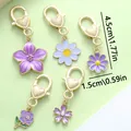 Set of 5 exquisite purple floral alloy charms with golden heart-shaped lobster clasps - Flower Heart (ER719) / 5 Pieces / Purple