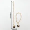 Elegant gold link chain keychain featuring a delicate black enamel butterfly pendant charm - Butterfly Pendant (LS455)