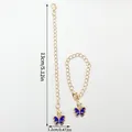 Elegant gold chain pendant with deep blue butterfly charm and 13cm measurement - Butterfly Pendant (LS459)