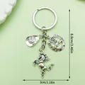 Silver metal Western cowboy themed keychain featuring horse, horseshoe, and hat charms - Vintage Silver Flying Horse Hat Horseshoe Set(LS280)