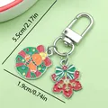 Christmas keychain with gingerbread wreath and snowflake charms measuring 5.5cm long - Christmas Wreath, Gingerbread Man & Snowflakes (ER839)