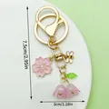 Pink cherry blossom and lily of the valley gold keychain with bee charm, 7.5cm. - ER1635 / Gold Purple Cherry Blossom Lily Bee