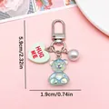 Cute holographic bear resin keychain featuring heart 'HUG ME' charm and white pearl - Transparent Green Iridescent Resin Bear (ER1934)