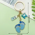 Cute blue baby outfit and bottle enamel keychain with infant feet charms for diaper bags - Blue Clothes Milk Bottle Footprints Style (ER1524)