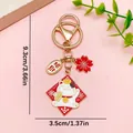 Traditional lucky cat keychain with cherry blossom charm in vibrant red and gold finish - Lucky Cat Blessing (ER1909) / 1 Piece (3.5x9.3cm) / Red/White