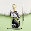 Shiny black and white cartoon cat alloy pendant keychain charm, size 4.2cm by 1.7cm - Black And White Cat (LS529) / 1 Piece
