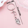 Silver anatomical heart keychain with EKG heartbeat line pendant, 3.58 inches long - Anatomical Heart ECG (ER2158) / Antique Silver