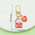 Süßer Weihnachts-Schlüsselanhänger mit Weihnachtsmann und Fäustling, 5,9x1,2 cm - Weihnachtsmann Handschuhe (LS499)