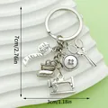 Detail showing sewing machine and scissors charms with overall 7cm length - Sewing Machine Iron Button Scissors Tape Measure (LS438)