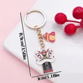 Traditional Chinese lion dance enamel keychain bag charm accessory, size 8.9cm x 3cm - Money Bag Luck Lion Dance (ER2154) / 3x8.9cm / Black