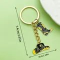 Western cowboy hat and boot keychain with gold finish and enamel detail - Black Enamel Hat Boot & Flame (ER1264)